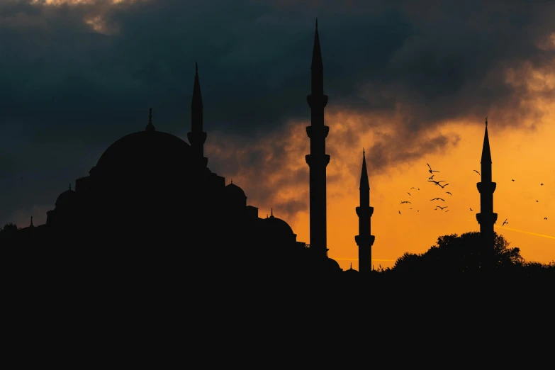 the silhouette of a mosque against a cloudy sky, inspired by Osman Hamdi Bey, pexels contest winner, hurufiyya, 2 5 6 x 2 5 6, late summer evening, black, navy