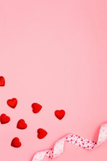 a bunch of red hearts on a pink background, by Elaine Hamilton, trending on pexels, 🐿🍸🍋, promo image, corners, cutest