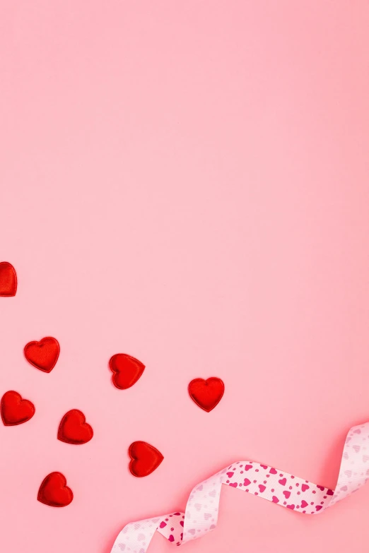 a bunch of red hearts on a pink background, by Elaine Hamilton, trending on pexels, 🐿🍸🍋, promo image, corners, cutest