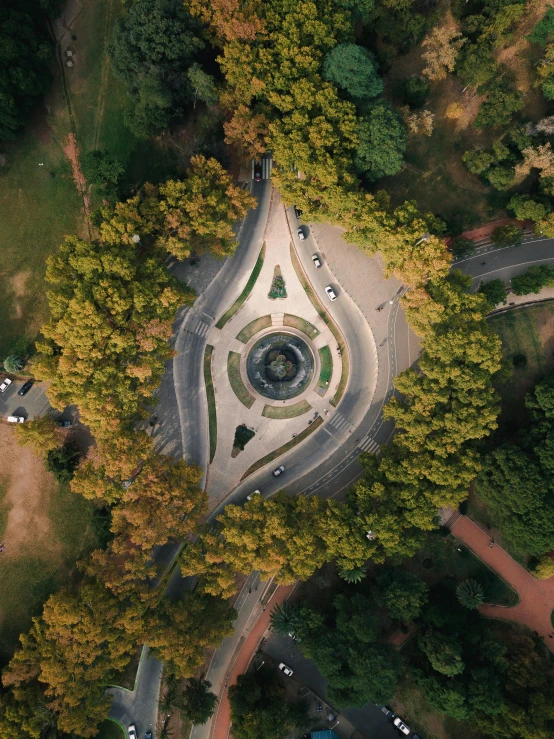 an aerial view of a circular fountain surrounded by trees, unsplash contest winner, buenos aires, monument, 8k resolution”, pentagon