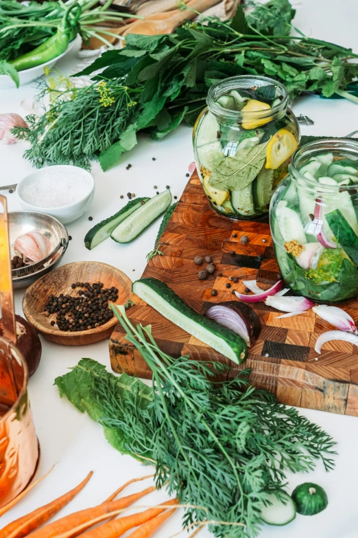 a table topped with lots of different types of vegetables, dreamscape in a jar, cucumber, flatlay, 4l