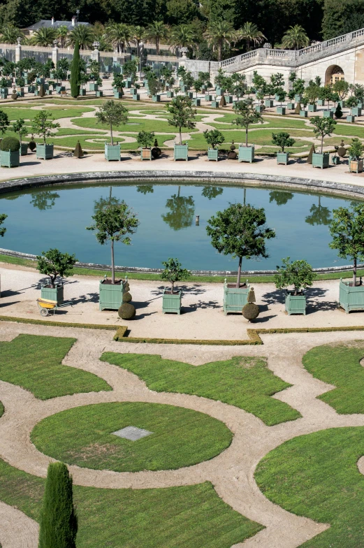 a large pond in the middle of a park, a digital rendering, by Karel Dujardin, photograph from above, french garden, award - winning photo ”, featuring marble fountains