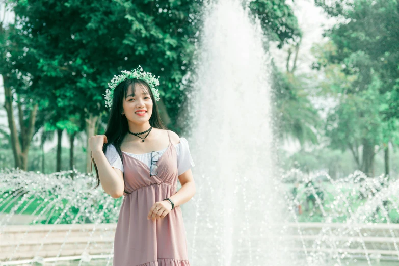 a woman standing in front of a fountain, by Cherryl Fountain, pexels contest winner, young cute wan asian face, wearing a laurel wreath, beautiful girlfriend, avatar image