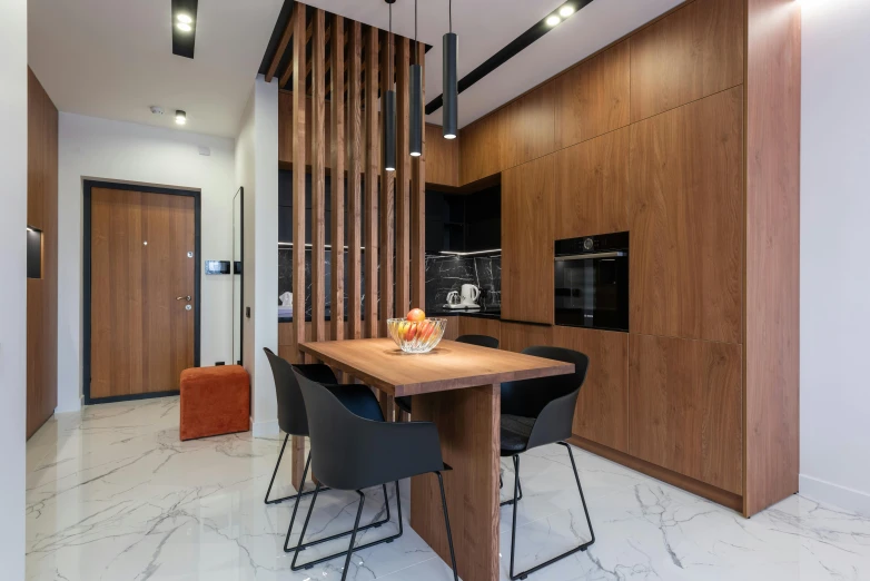 a kitchen with a wooden table and black chairs, by Adam Marczyński, office ceiling panels, brown wood cabinets, neo kyiv, profile image