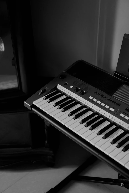 a black and white photo of a keyboard, a black and white photo, inspired by Bryan Organ, unsplash, studio room, summer night, ansel ], shot with sony alpha