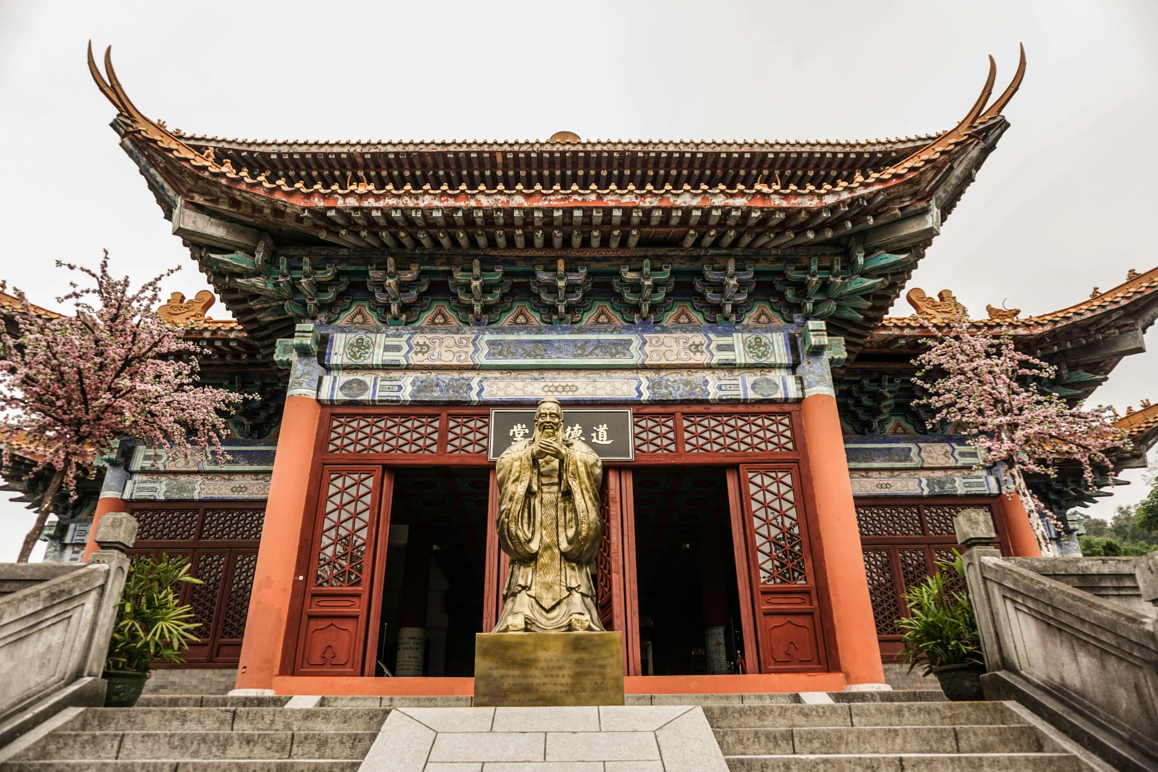 a building with a statue in front of it, inspired by Li Gonglin, pexels contest winner, cloisonnism, monastery, 2 5 6 x 2 5 6 pixels, entrance, fullbody view