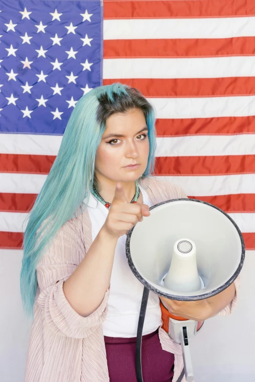 a woman holding a megaphone in front of an american flag, trending on reddit, renaissance, teal hair, high quality photo, discord profile picture, pokimane