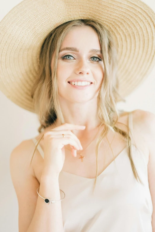 a woman in a straw hat poses for a picture, pexels contest winner, sydney sweeney, delicate soft hazy lighting, radiant smile. ultra wide shot, studio photo