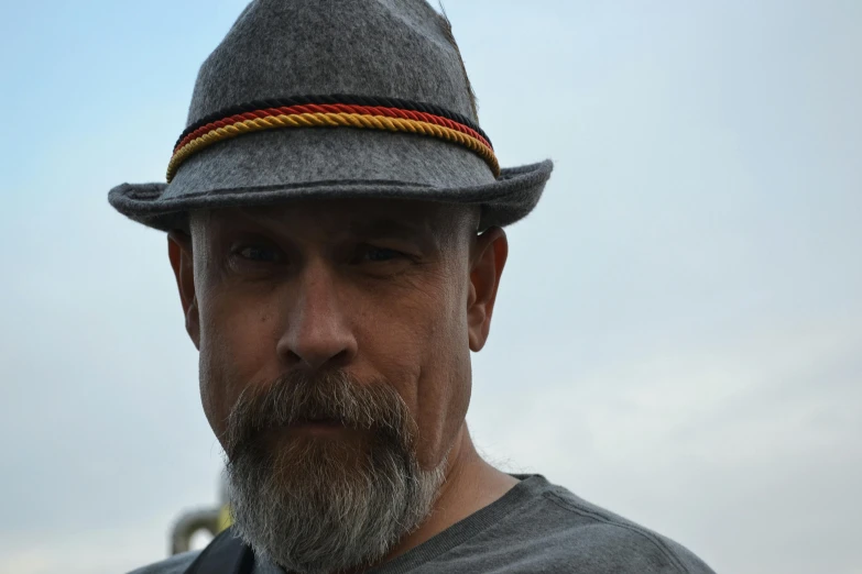 a man with a beard wearing a hat, a photo, inspired by Harald Giersing, avatar image, profile image, color photograph, profile pic