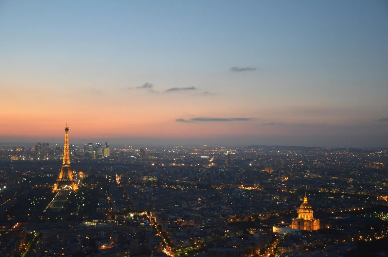 the view of the eiffel tower from the top of the eiffel tower, unsplash contest winner, city lights on the horizon, twilight skyline, three views, dezeen