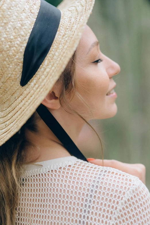 a close up of a person wearing a hat, in summer, profile image, asian woman, portrait image