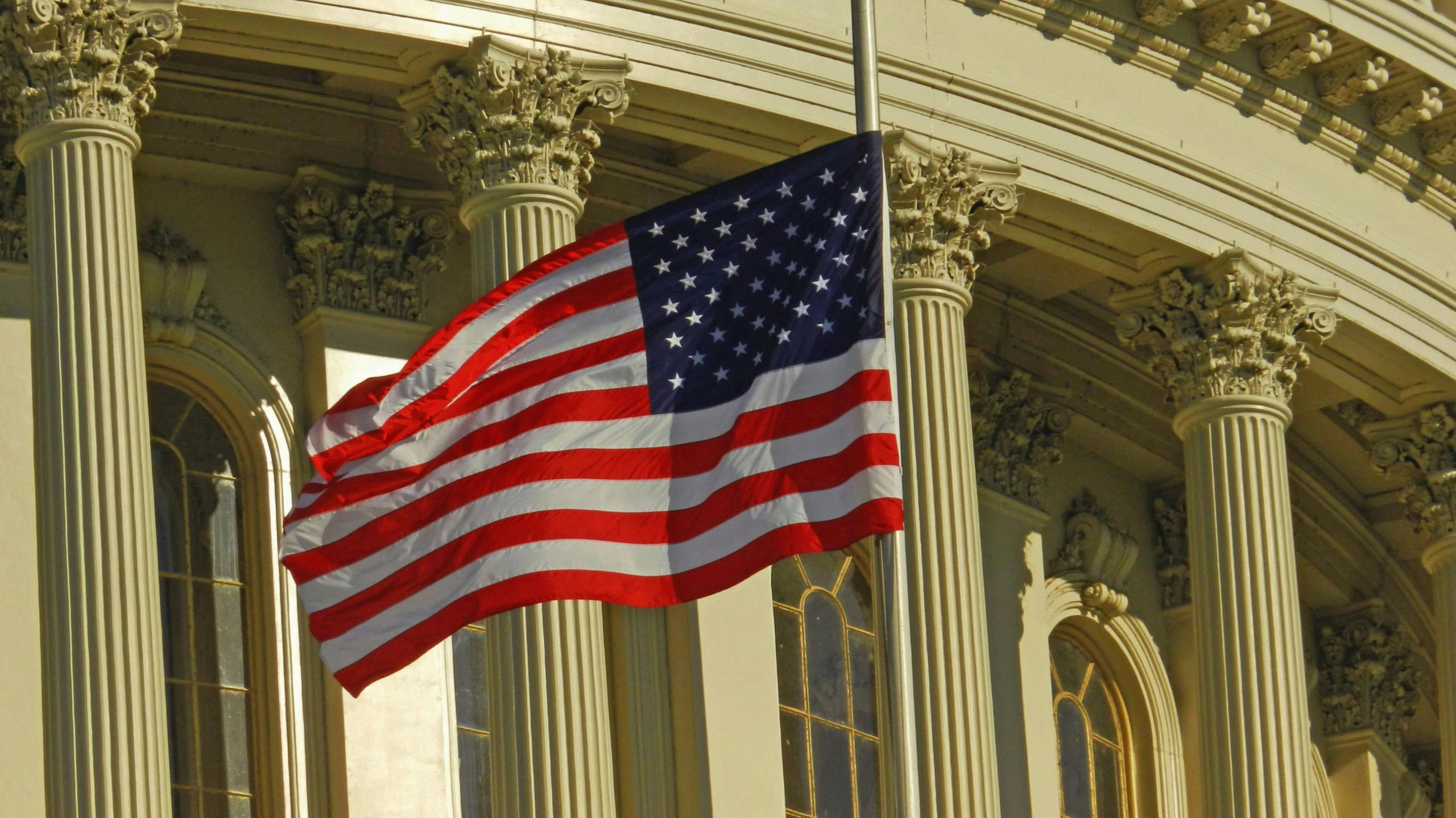 an american flag flying in front of the u s capitol building, by Kristin Nelson, renaissance, deaths, slide show, pillar, sorrow