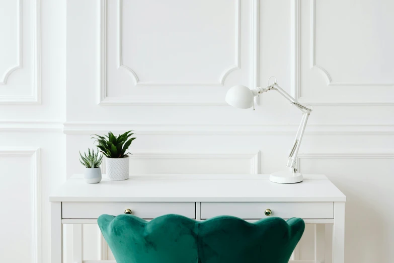 a white desk with a green chair and a potted plant, trending on pexels, classical lighting, detailed product image, jade green, detailed white