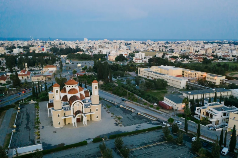 an aerial view of a church in the middle of a city, cyprus, fan favorite, carson ellis, wideshot