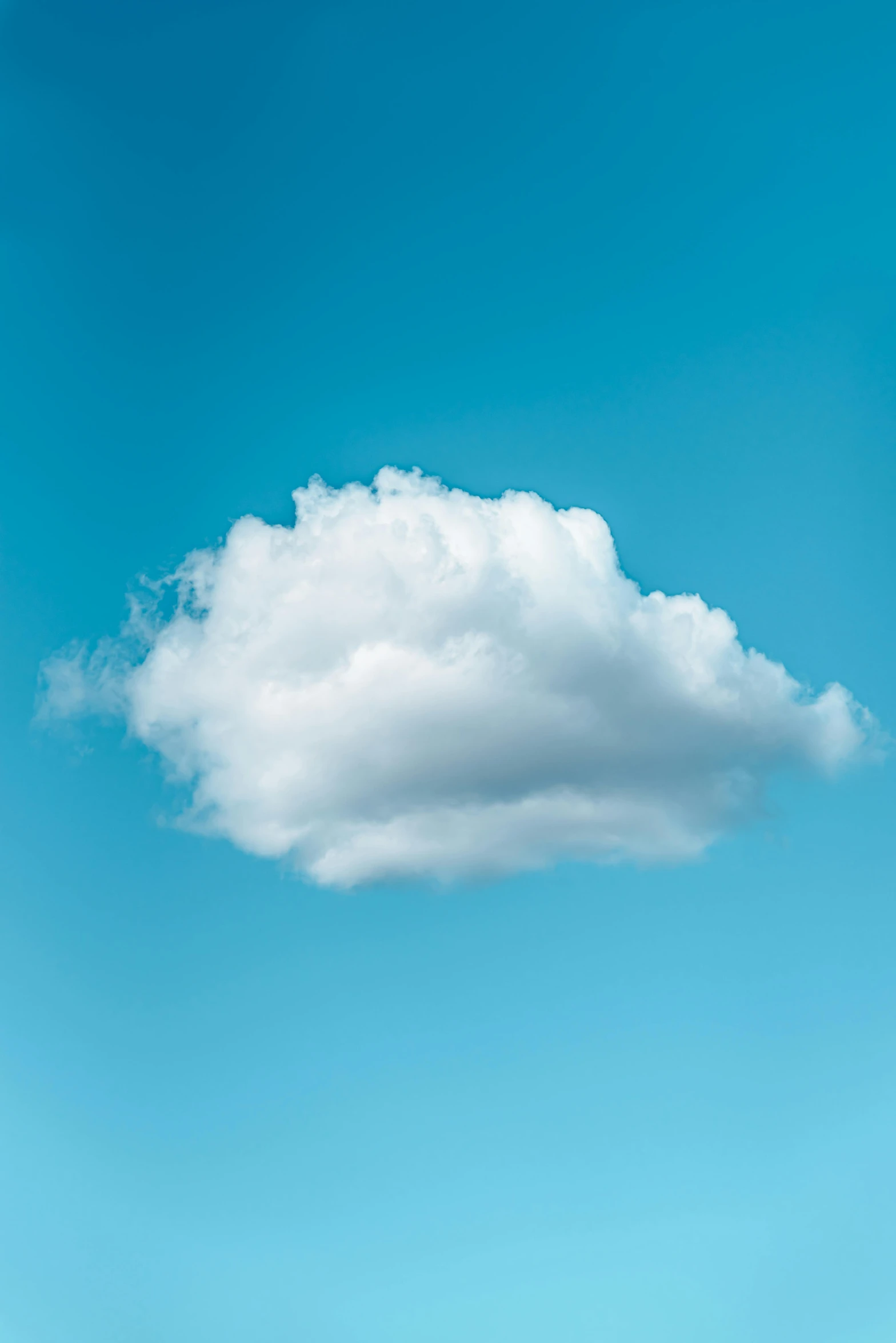 a single cloud floating in the blue sky, inspired by René Magritte, unsplash, profile image, cumulus, cloudless sky, giant cumulonimbus cloud