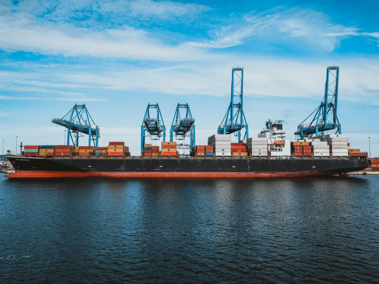 a large cargo ship sitting on top of a body of water, pexels contest winner, avatar image, port, high quality upload, focus on full - body