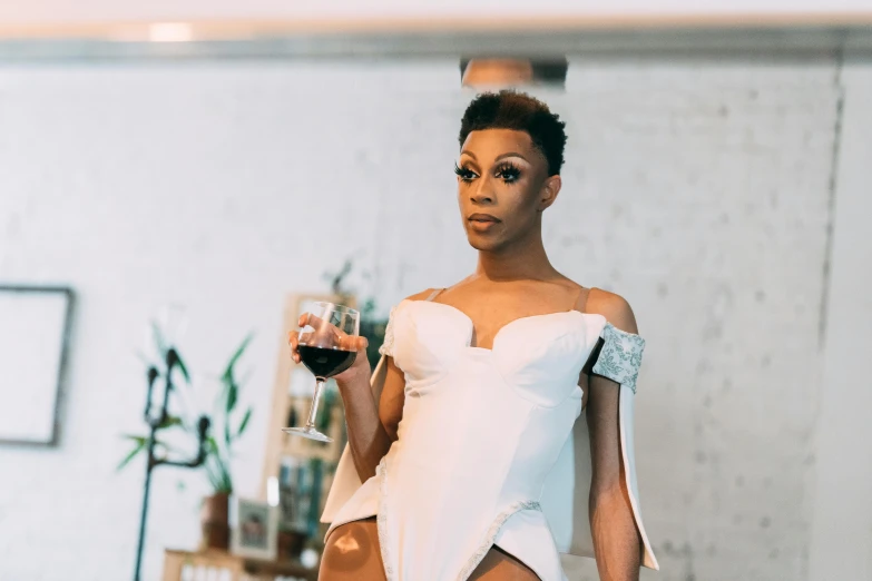 a woman in a white dress holding a glass of wine, pexels contest winner, renaissance, ru paul\'s drag race, ashteroth, delicate androgynous prince, devon cady-lee