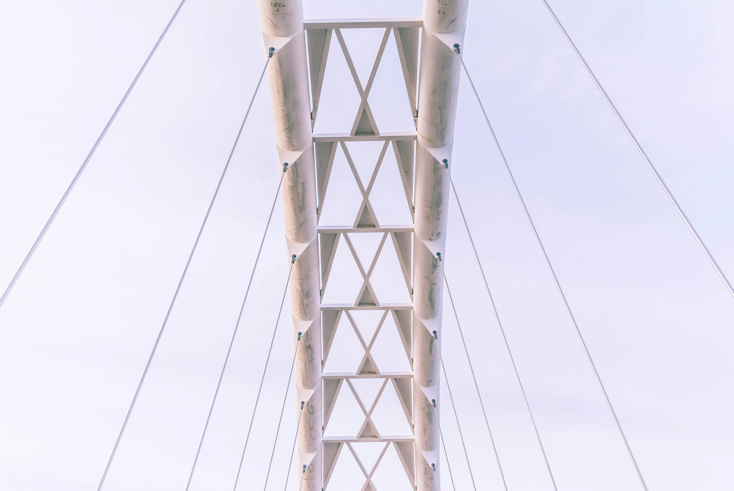 a group of people walking across a bridge, an album cover, inspired by Christopher Wren, pexels contest winner, postminimalism, symmetrical detail, cables, white, high arches