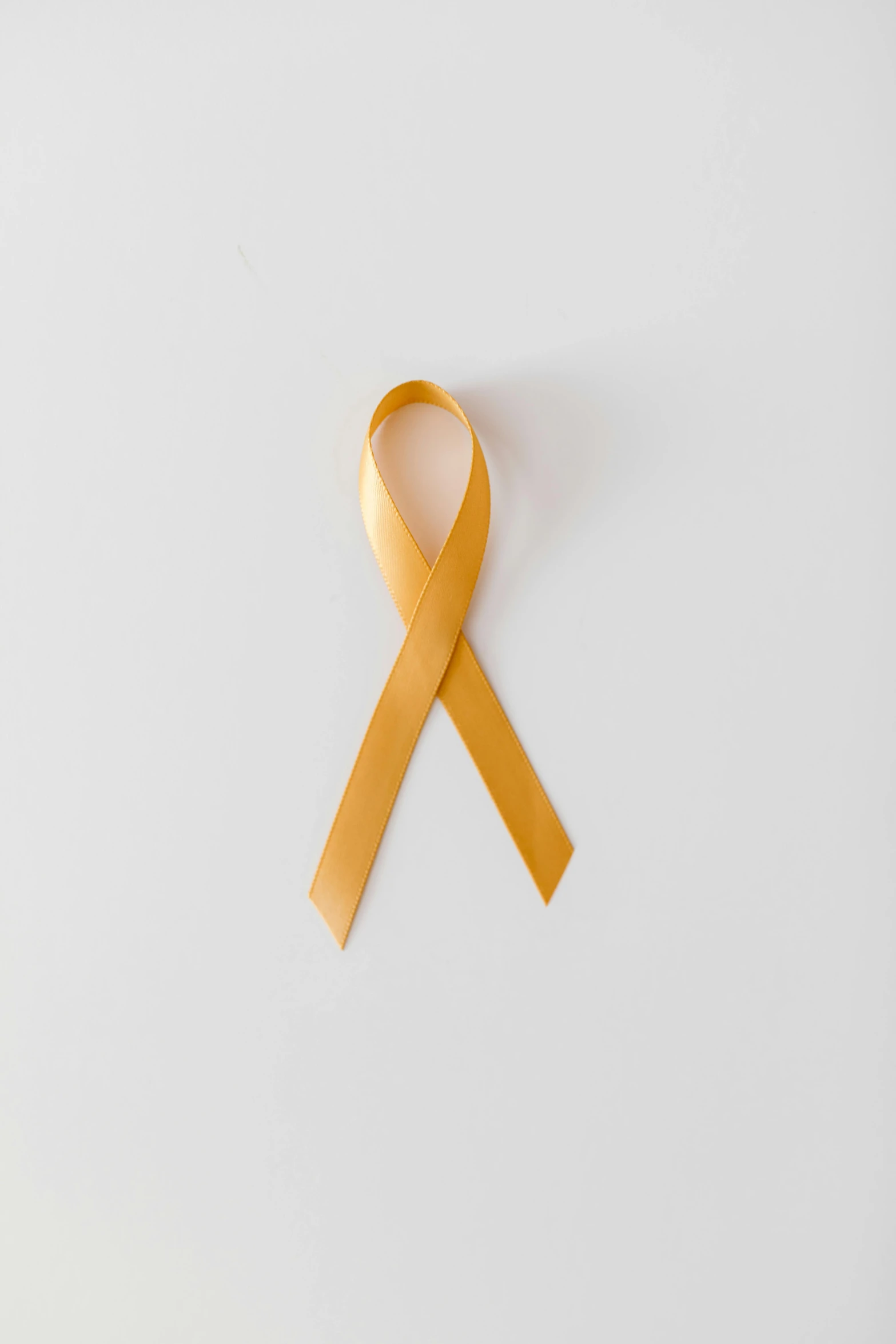 a yellow ribbon on a white background, a picture, by Gavin Hamilton, agent orange, 15081959 21121991 01012000 4k, instagram post, marc newsom