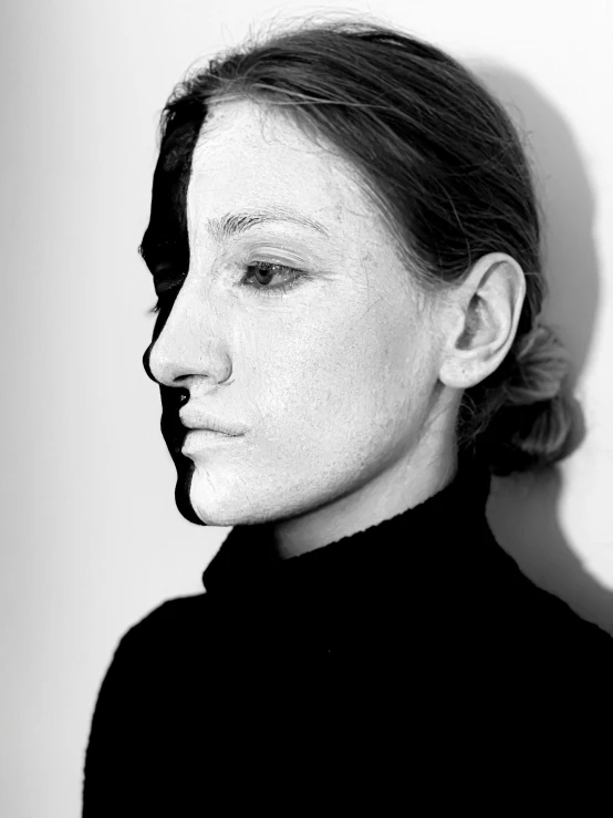 a black and white photo of a woman, a black and white photo, inspired by Marina Abramović, half horse - half mouse, anna nikonova aka newmilky, young woman's face, photoscanned