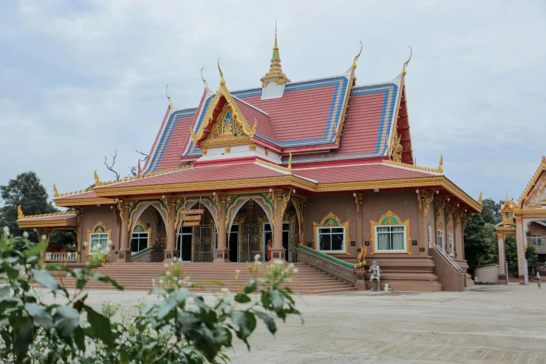 a large brown building with a red roof, unsplash, cloisonnism, thai temple, avatar image