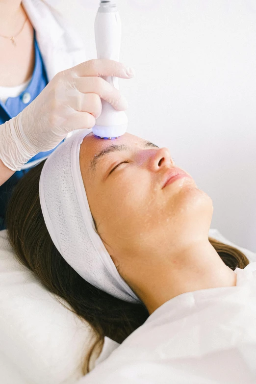 a close up of a person laying on a bed, facial precision, crown of (white lasers), thumbnail, maintenance