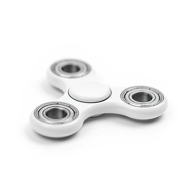 a white fidgetr sitting on top of a white surface, spinning whirlwind, highly detailed product photo, resplendent and proud of bearing, listing image