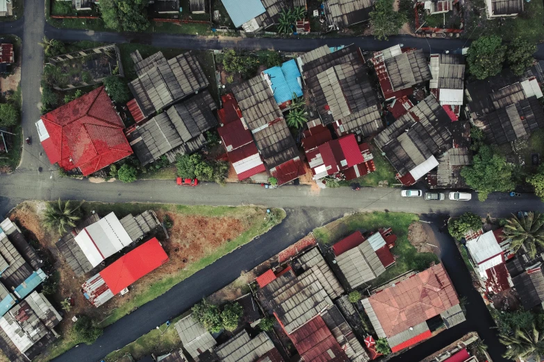 a bird's eye view of a small town, an album cover, pexels contest winner, south jakarta, red roofs, displacement mapped, alleys