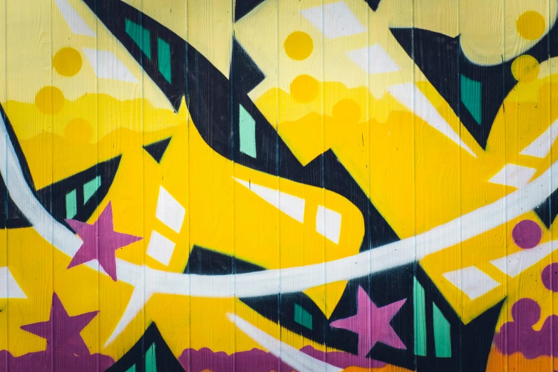 a yellow fire hydrant sitting in front of a graffiti covered wall, graffiti art, by Niko Henrichon, pexels contest winner, graffiti, neon yellow stars, panels, yellow purple green black, on a yellow canva