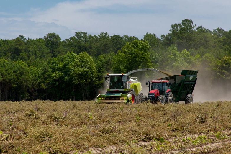 a couple of tractors that are in the dirt, in louisiana, avatar image, harvest, 2 0 2 2 photo