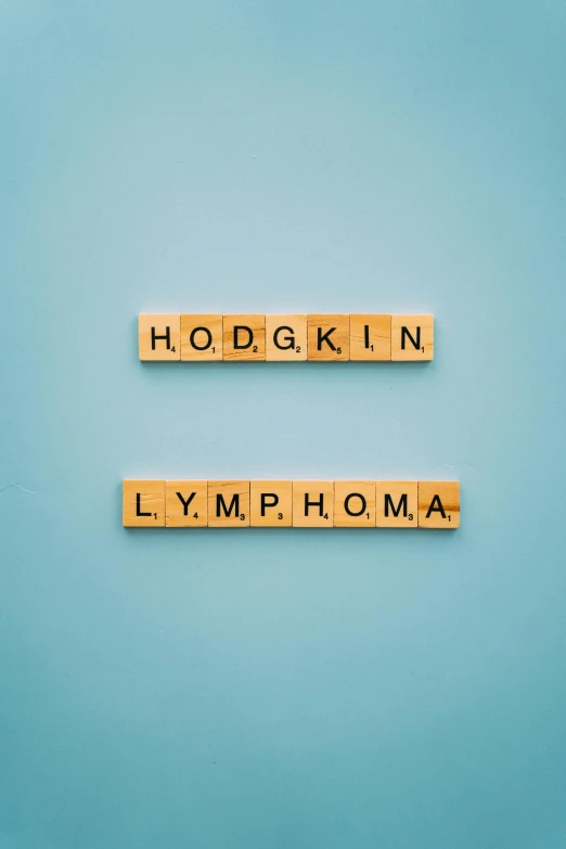 scrabbles spelling hodgk in lymphma on a blue background, an album cover, inspired by Eliot Hodgkin, shutterstock, wyoming, thumbnail, lightroom preset, abcdefghijklmnopqrstuvwxyz