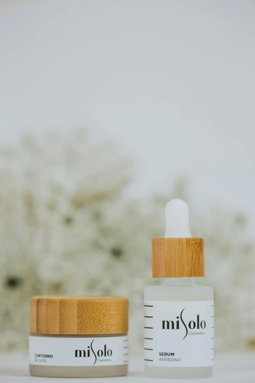 a bottle of lip balm next to a jar of lip balm, inspired by Li Di, unsplash, made of bamboo, clean and pristine design, thumbnail, handmade