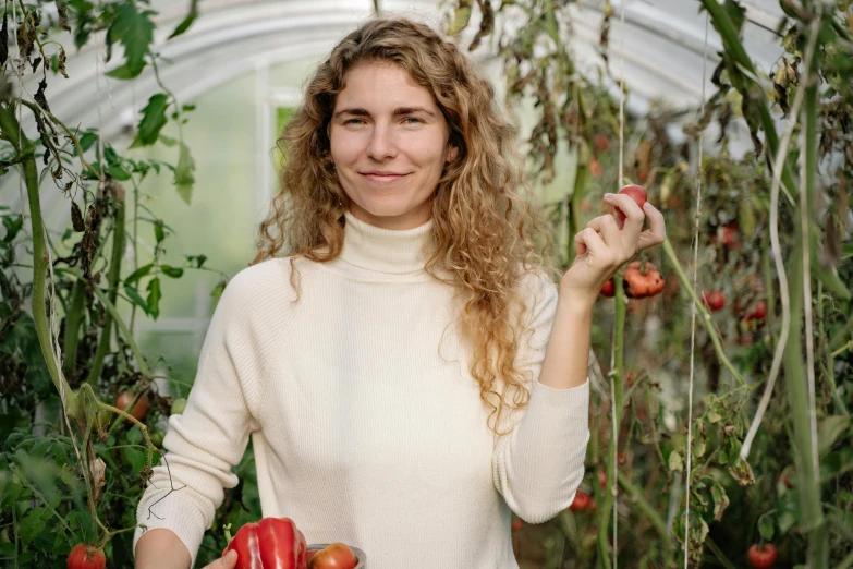 a woman holding a basket of tomatoes in a greenhouse, a portrait, inspired by Elsa Beskow, pexels contest winner, portrait image, miro petrov, rosamund pike as the doctor, organic and robotic