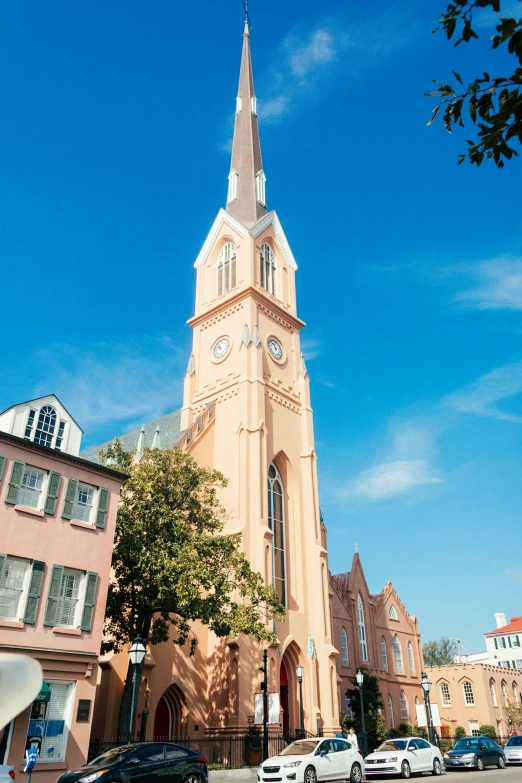 a tall clock tower towering over a city street, by Elizabeth Charleston, lead - covered spire, savannah, church chandelier, exterior view