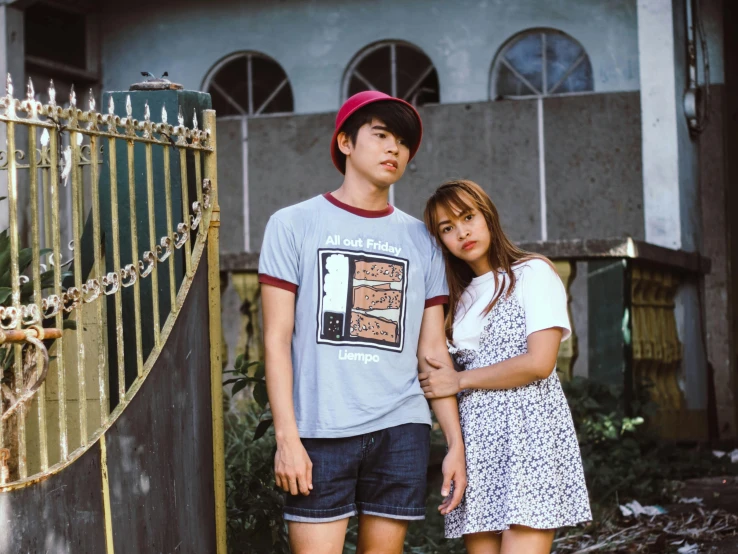 a man and a woman standing next to each other, unsplash, realism, teenage boy, retro 9 0 s japanese, 15081959 21121991 01012000 4k, short sleeves