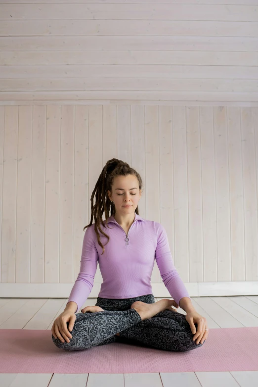 a girl sitting in a lotus position on a yoga mat, a portrait, by Alice Mason, trending on unsplash, renaissance, aged 13, square, hammershøi, high quality picture