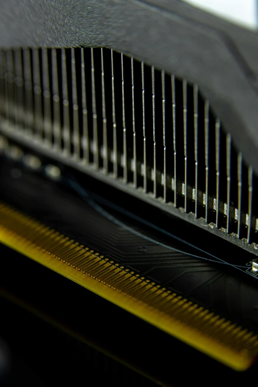 a close up of a computer mother board, a macro photograph, by Jason Felix, unsplash, computer art, sleek spines, graphics card, subtle giger, close - up profile