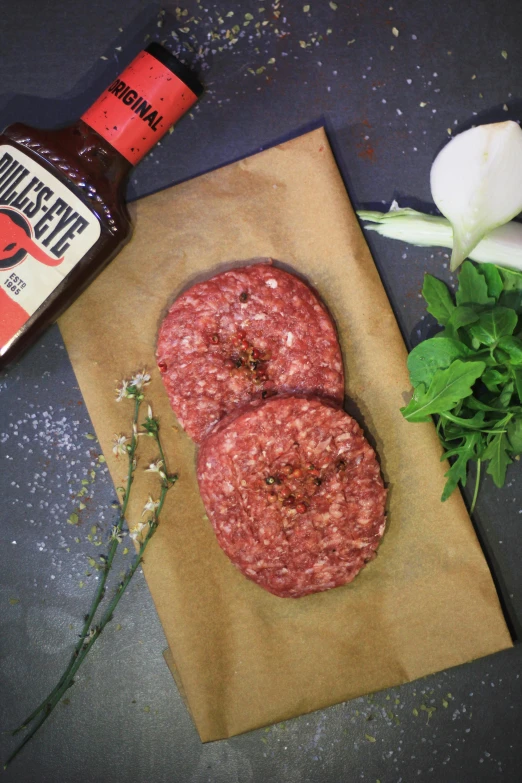 a couple of meat patties sitting on top of a cutting board, a portrait, by Daniel Lieske, 6 pack, mule, listing image, malaysian