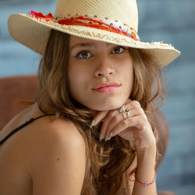 a beautiful young woman wearing a straw hat, a portrait, by Matthias Stom, pixabay, avatar image, indoor picture, colombian, mini model