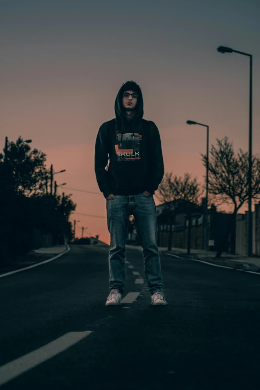 a man standing in the middle of a road, wearing jeans and a black hoodie, discord profile picture, artemixel, profile image