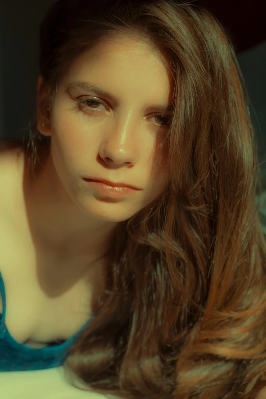 a beautiful young woman laying on top of a bed, inspired by Elsa Bleda, flickr, renaissance, close-up portrait film still, anya_taylor-joy, color footage, laetitia casta