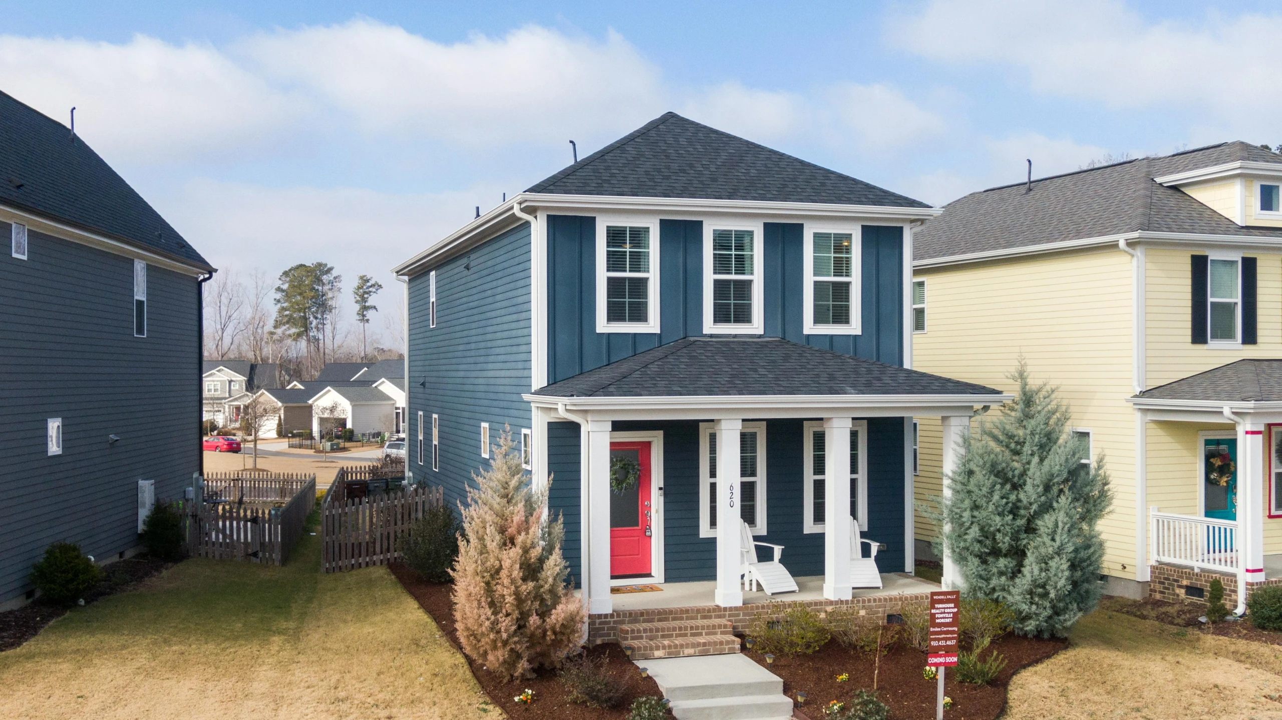 a couple of houses that are next to each other, a portrait, by Carey Morris, unsplash contest winner, blue and red two - tone, square, wide angle exterior 2022, wide high angle view