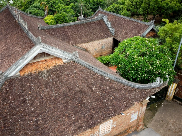 a bird's eye view of the roof of a building, inspired by Cui Bai, preserved historical, profile image, vietnam, brown