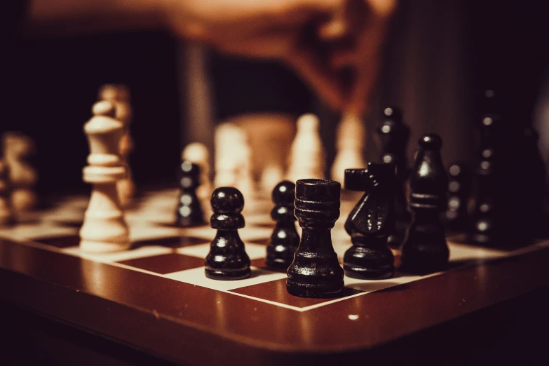 a close up of a chess board with chess pieces on it, by Jesper Knudsen, unsplash, figuration libre, arm wrestling, profile image, 🦩🪐🐞👩🏻🦳, board games on a table