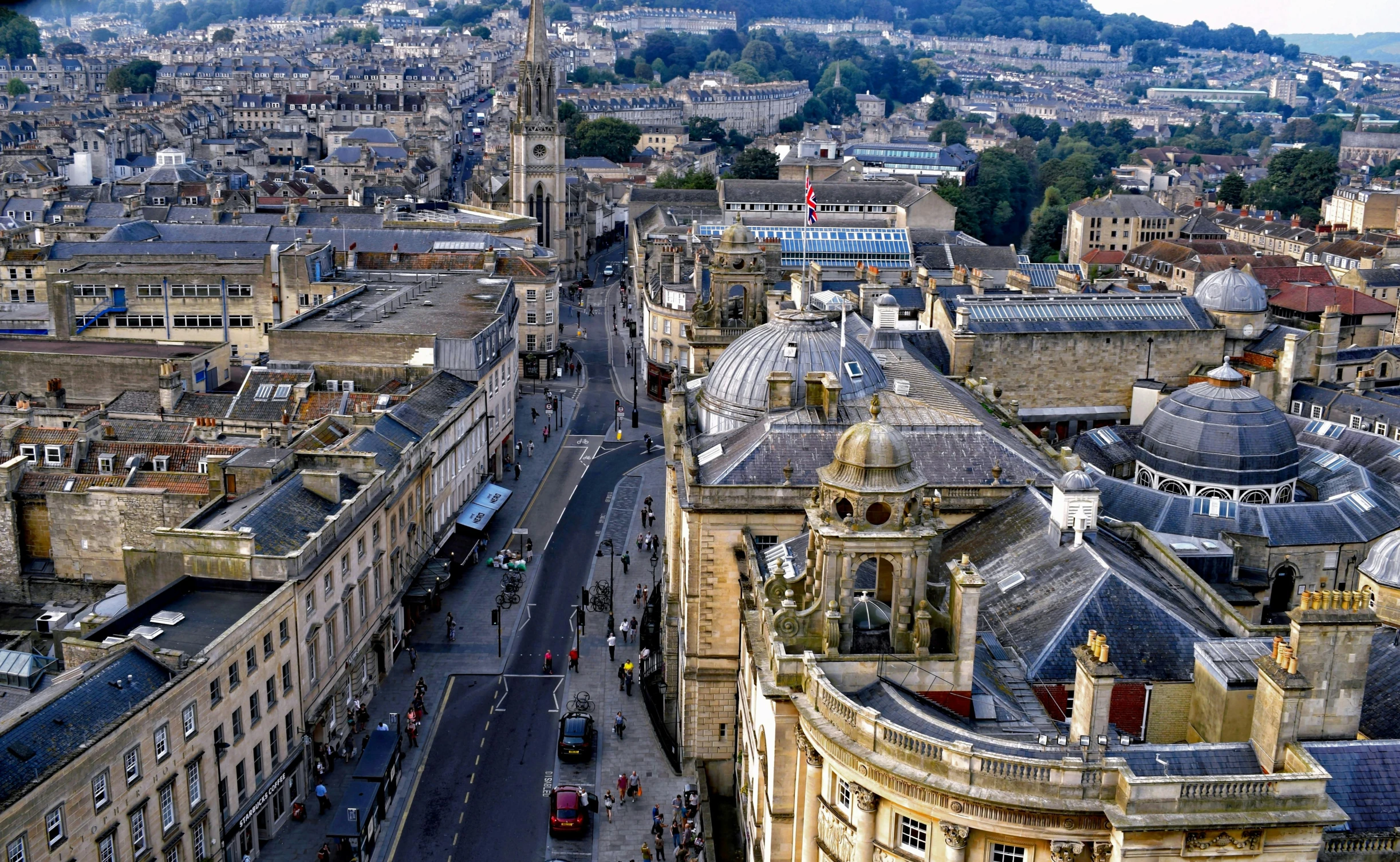 a view of a city from the top of a building, by David Donaldson, pexels contest winner, baroque, bath, slide show, square, hd footage