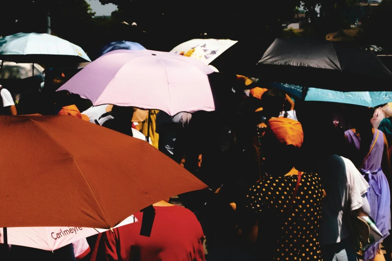 a group of people standing next to each other holding umbrellas, a photo, trending on unsplash, visual art, parade, 15081959 21121991 01012000 4k, flat colour, rectangle