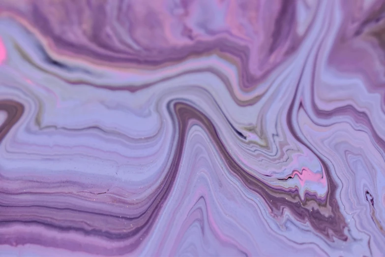 a close up of a liquid painting on a surface, trending on pexels, light purple, ancient swirls, pink, synth - wave