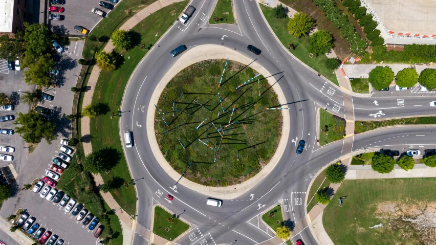 an aerial view of a roundabout in a city, pexels contest winner, land art, from wheaton illinois, outdoor art installation, halo array, signed