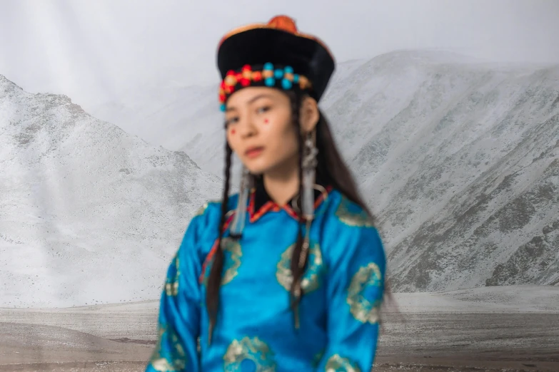 a woman in a blue dress standing in front of a mountain, an album cover, inspired by Guo Xi, hyperrealism, wearing authentic attire, inuk, portrait n - 9, royal attire akira