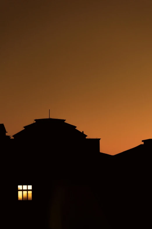 a silhouette of a building with a clock tower, by Attila Meszlenyi, ((sunset)), panorama, beijing, 4 0 0 mm